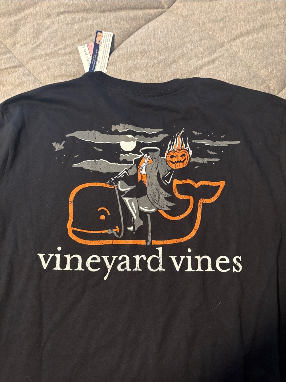 Vineyard Vines Black Tee with Orange & Gray Halloween Whale Graphic